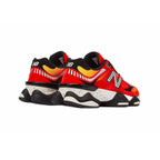 New Balance 9060 Schuhe Herren Rot Gelb und Schwarz Design Futuristico